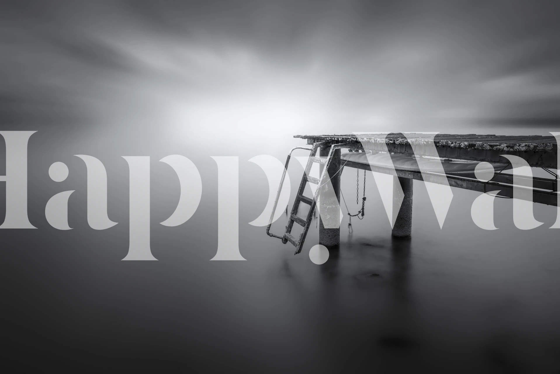 The Pier III black and white wall mural of a foggy maritime scene with an extending pier