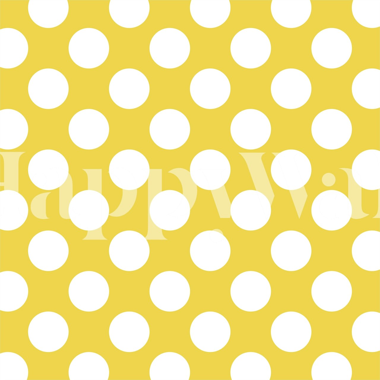 Yellow wall mural with white polka dot pattern