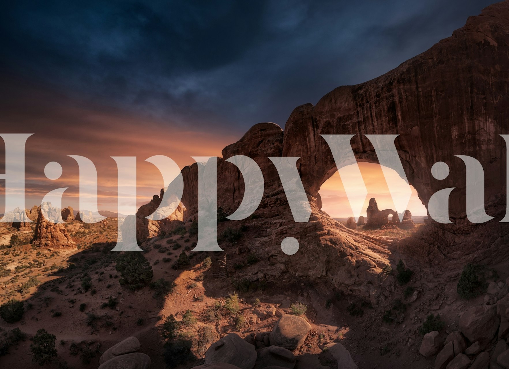 Natural rock arch formation wall mural under a dusky sky