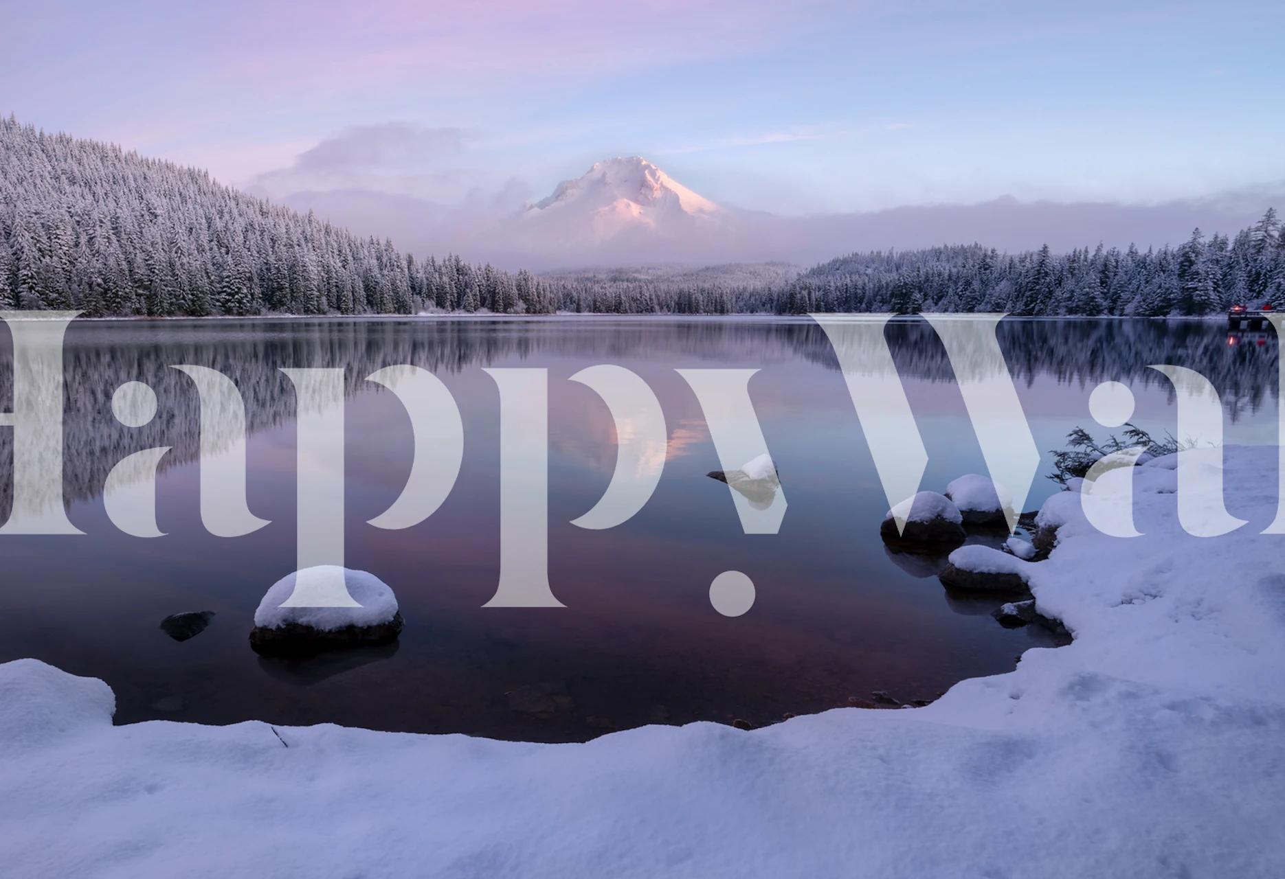 Snowy landscape with a lake, pink skies, and evergreen trees wallpaper