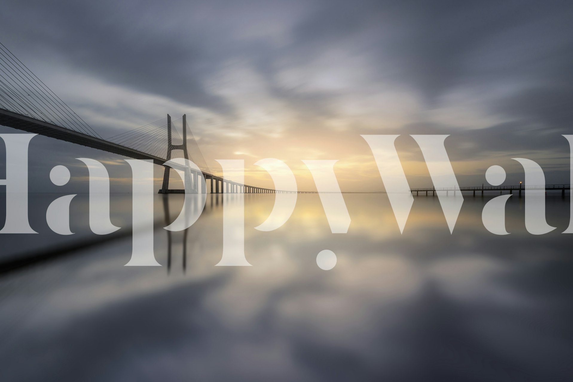 Bridge reflection on water at sunset with soft colors wallpaper