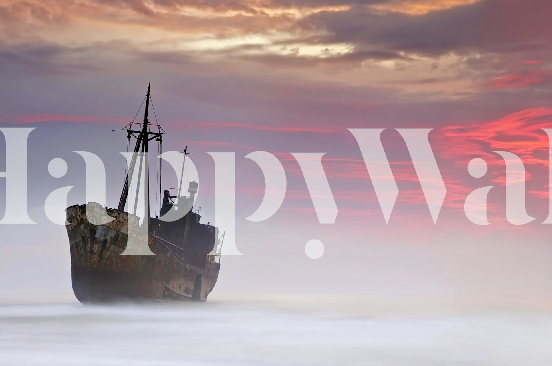 Shipwreck in ocean mist under purple and orange sky wallpaper