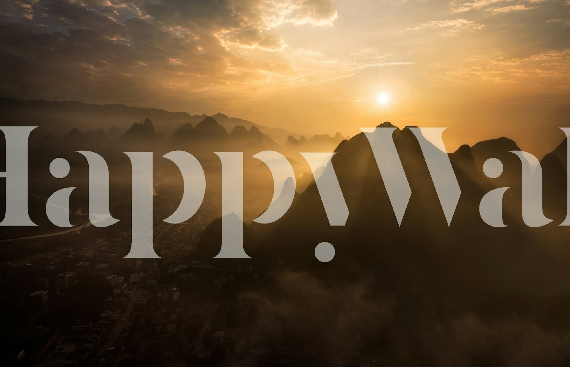 Misty mountain landscape during sunrise wallpaper