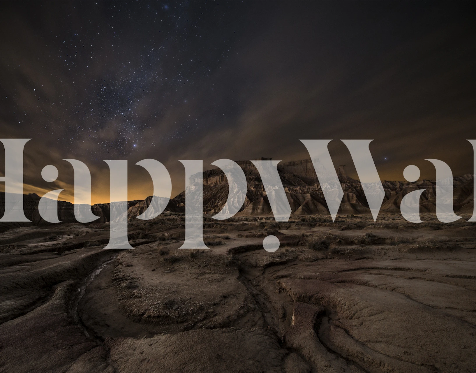 Starry night sky over desert landscape wall mural titled Night Wind