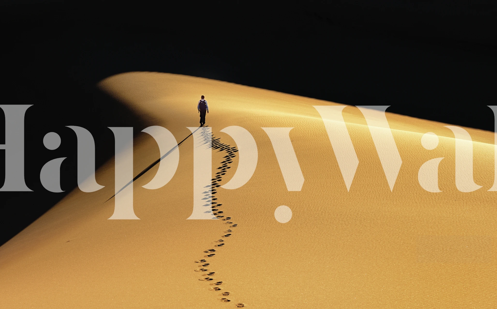Desert landscape with golden sands and footprints wallpaper