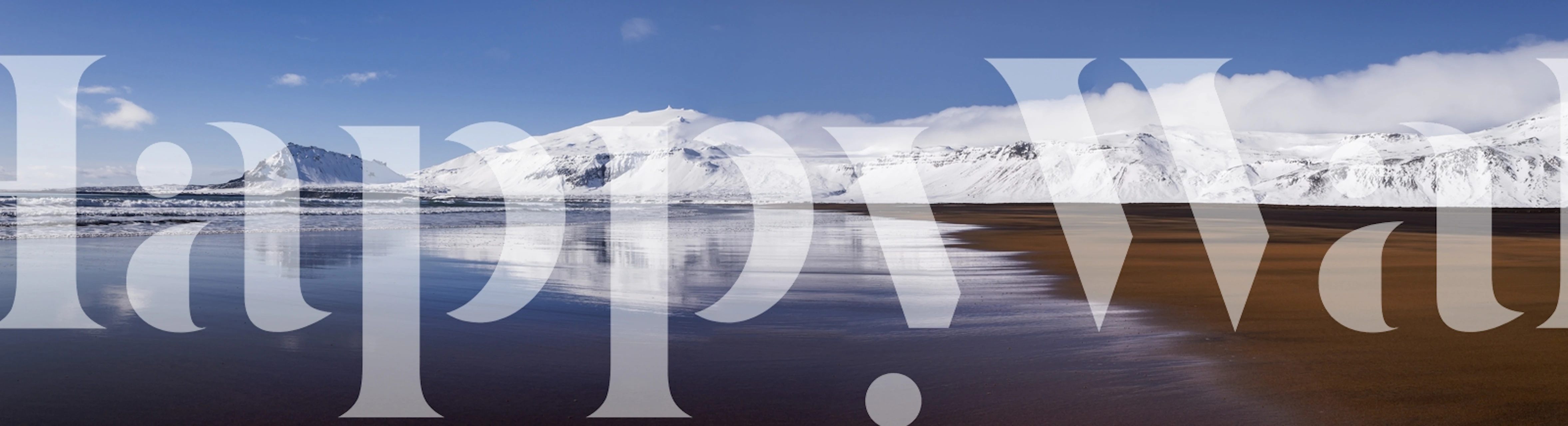 Mountain landscape with blue sky and sandy beach wallpaper