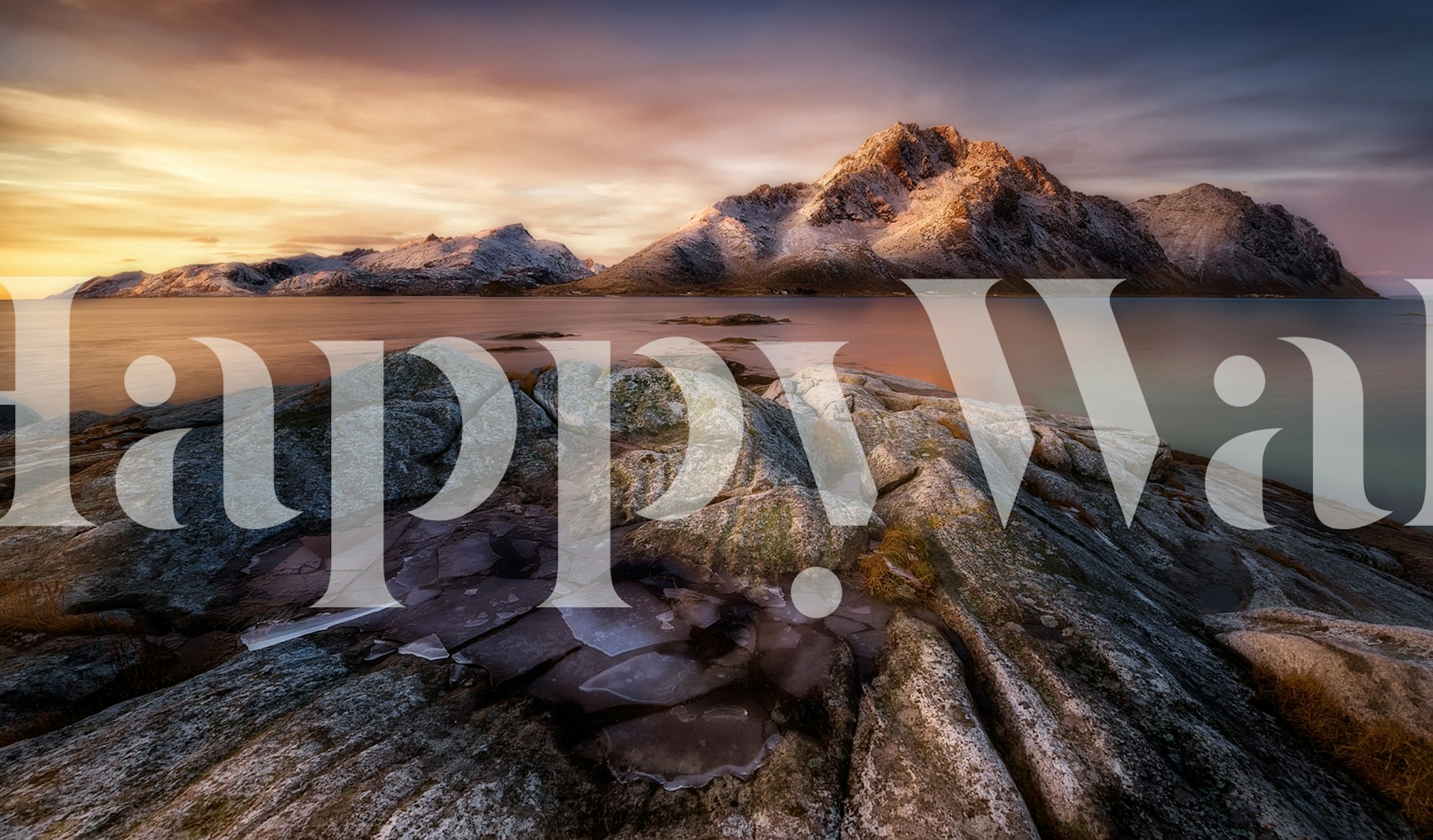 Frozen Sunrise mountain landscape wallpaper in soft tones.