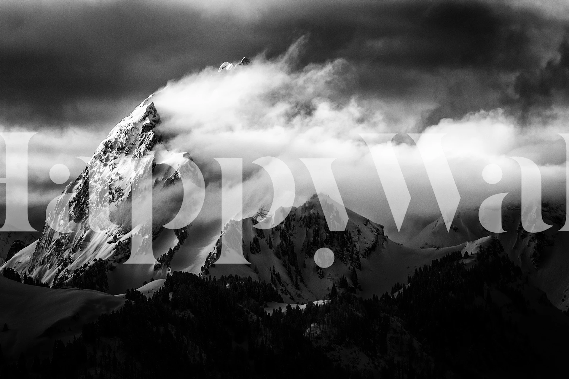Black and white wall mural with mountain peak and swirling clouds