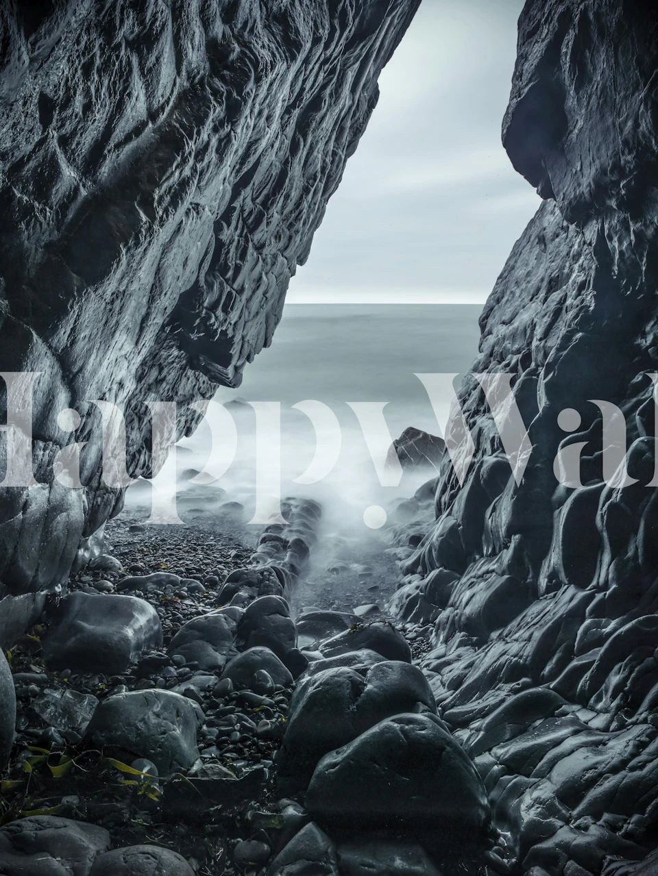 Nature's Sculpture wall mural featuring misty seascape with sculpted rocks