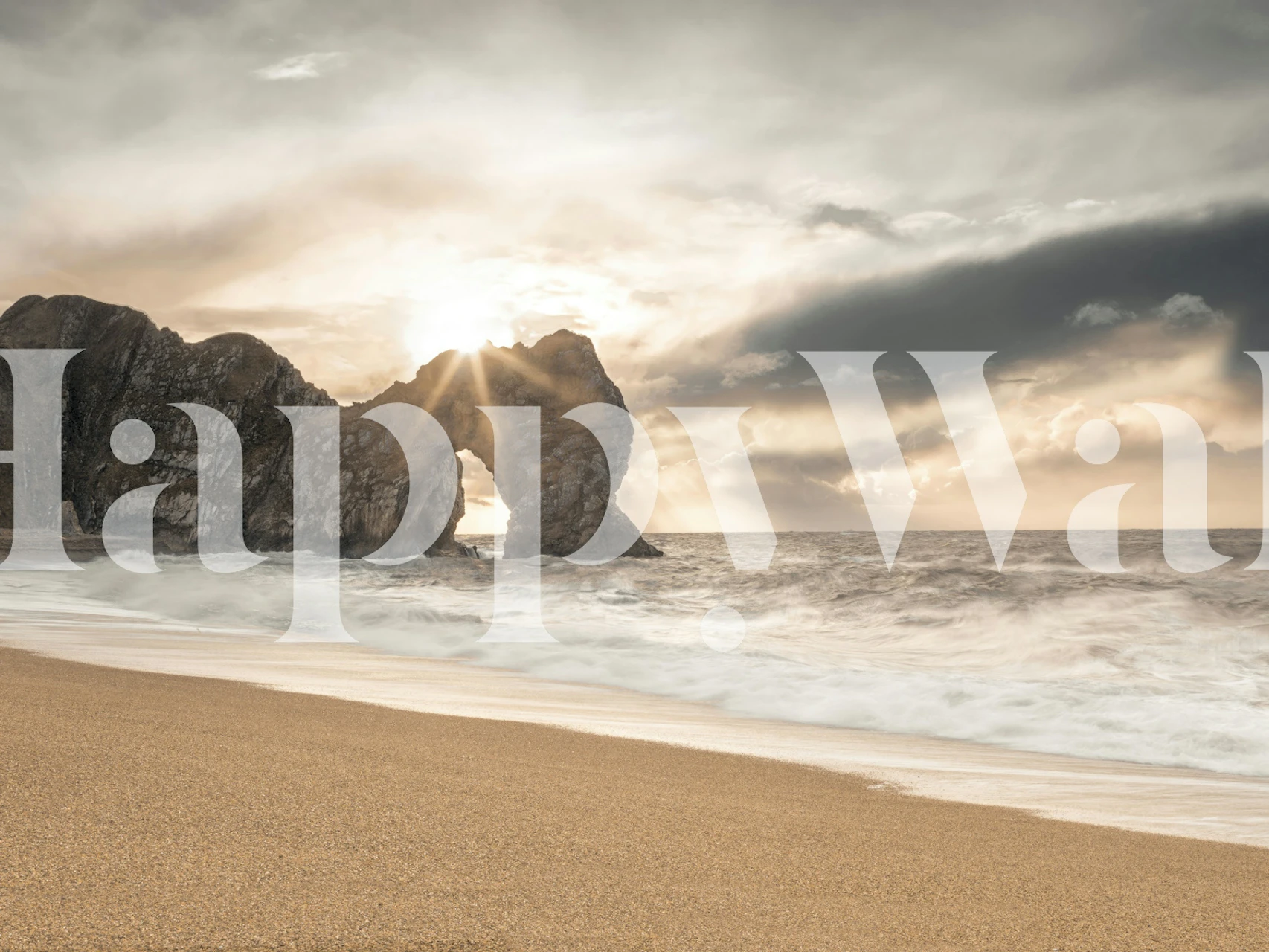 Coastal scene with Durdle Door rock formation, sandy beach, and ocean wallpaper