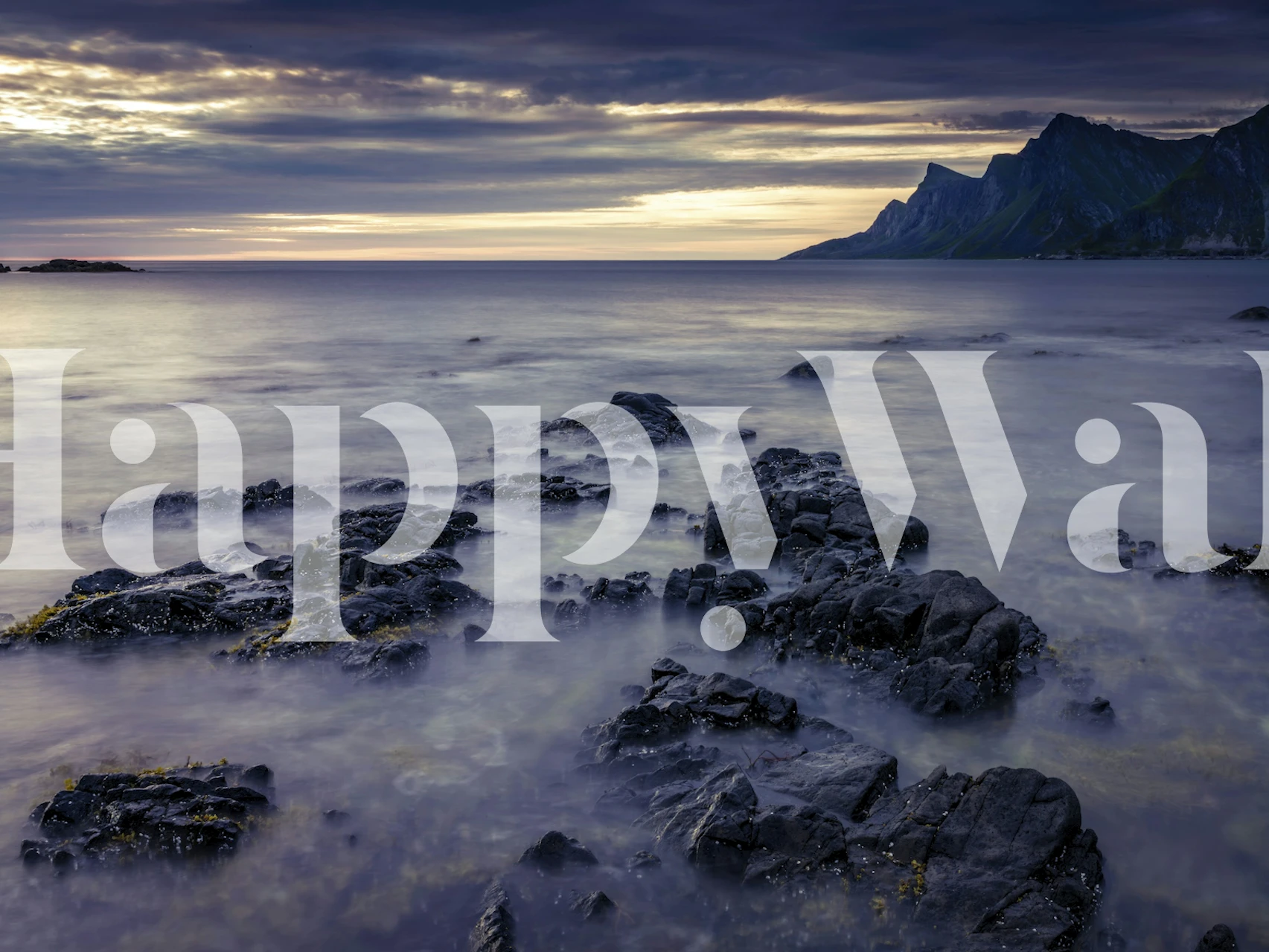 Rocky shore and ocean view wallpaper in soft blue tones