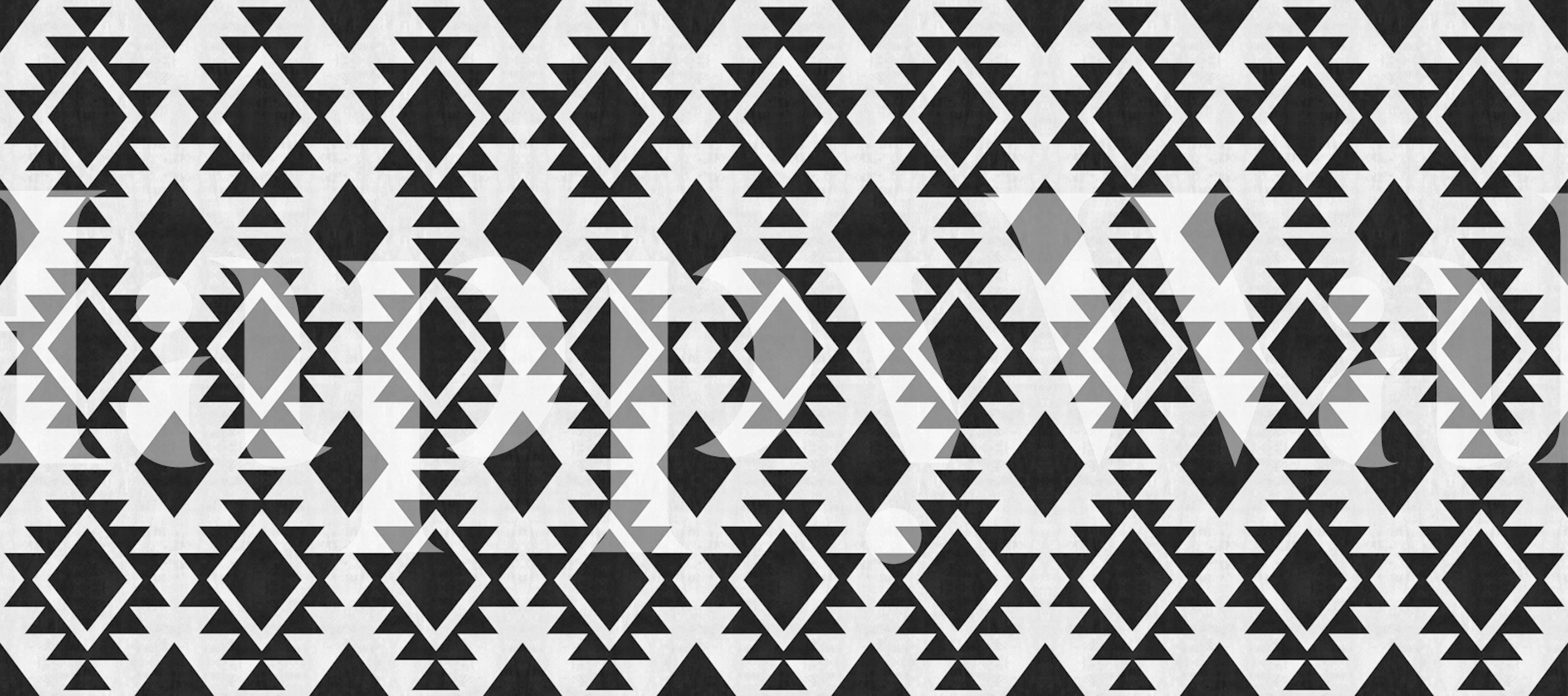 Black and white tribal wallpaper in a room