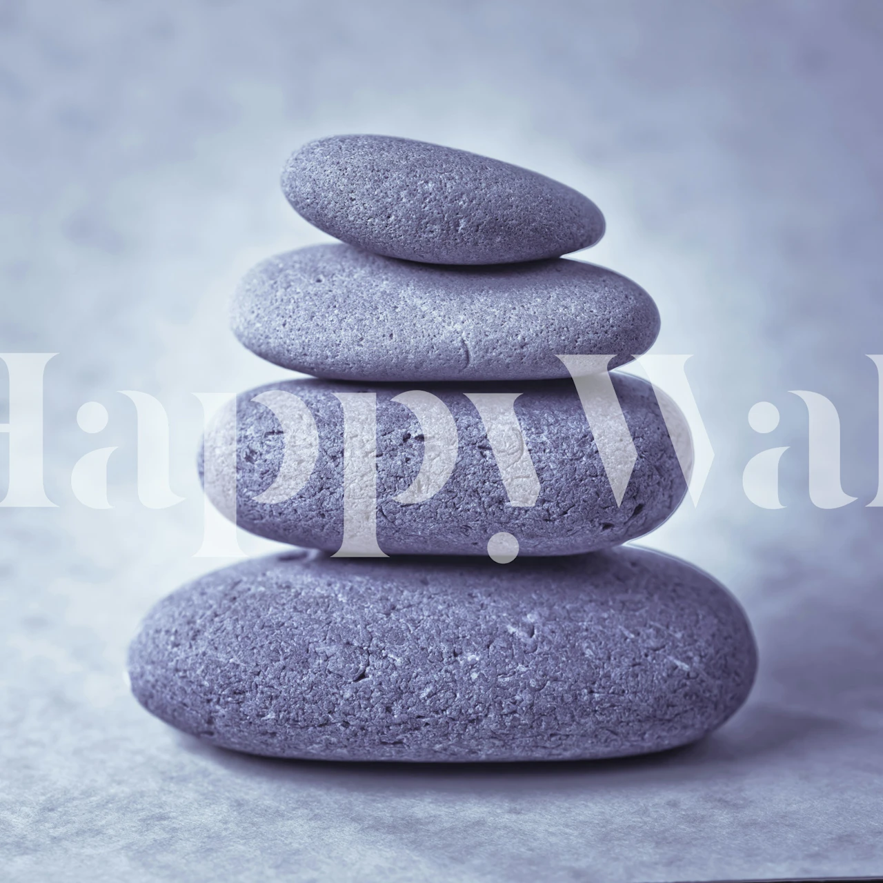 Stack of gray pebbles on a light background wallpaper