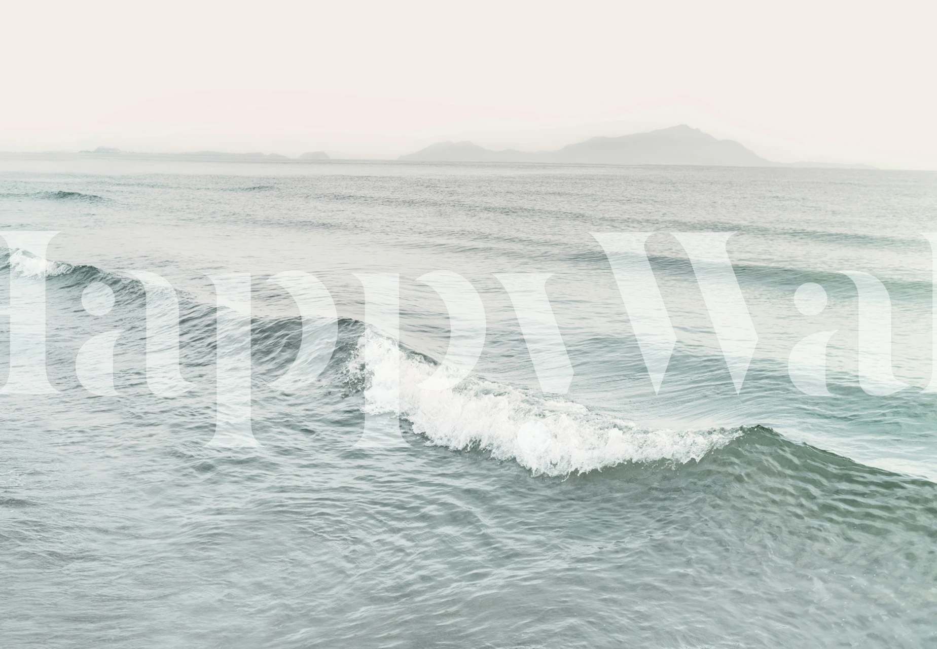 Sea wave wallpaper in a coastal setting