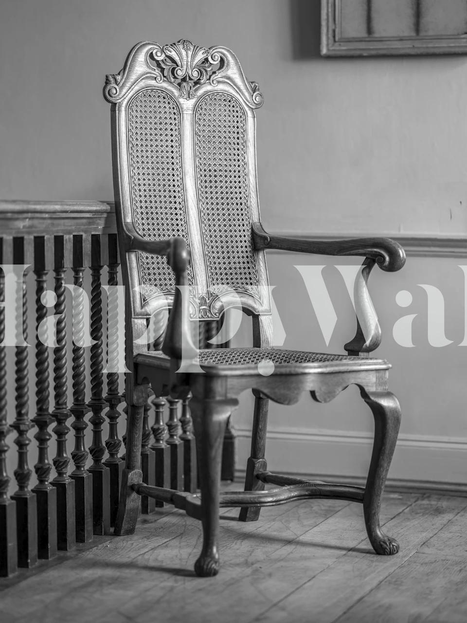 Vintage wooden chair in black and white wallpaper