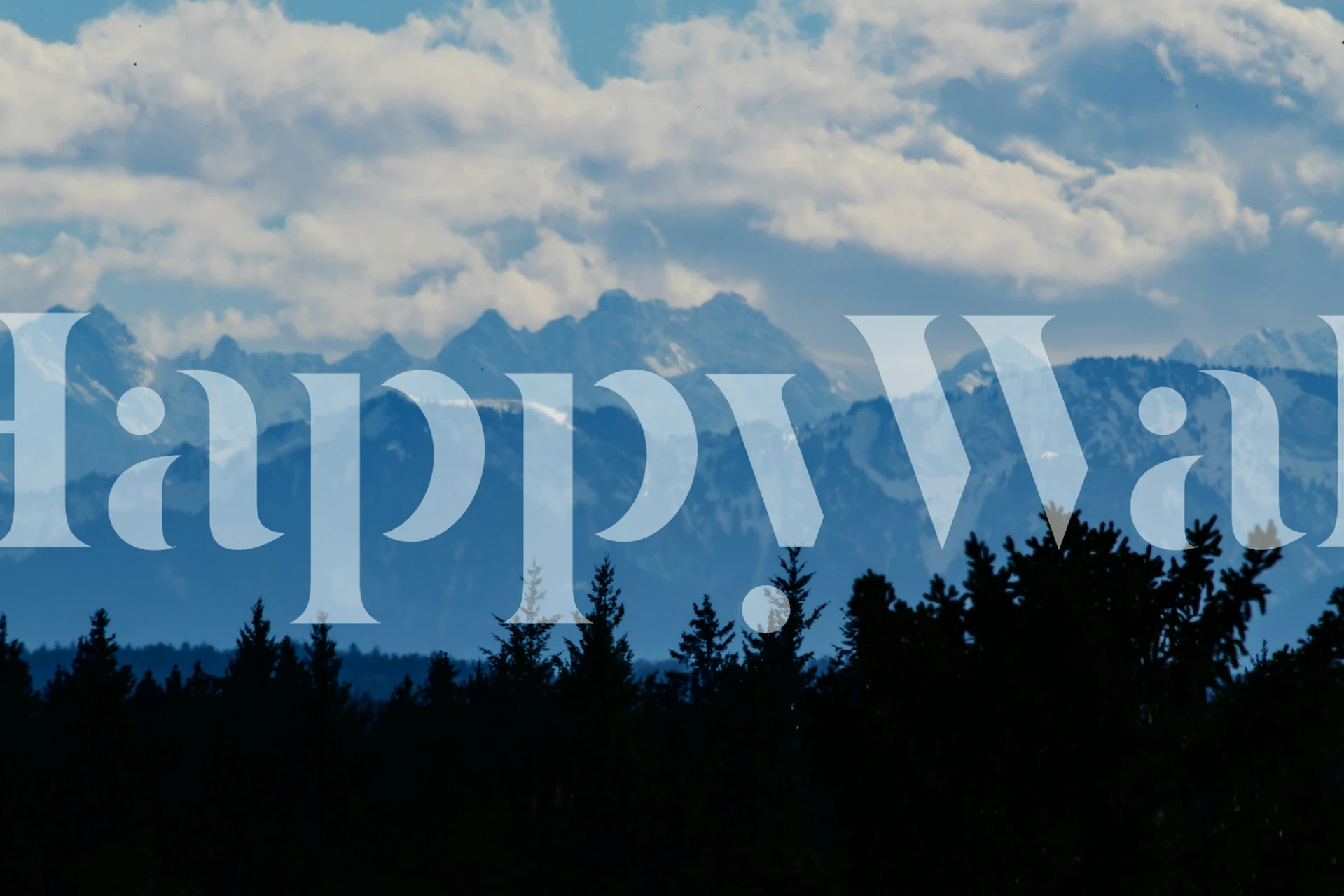 Dark trees silhouette against blue mountains and clouds wallpaper