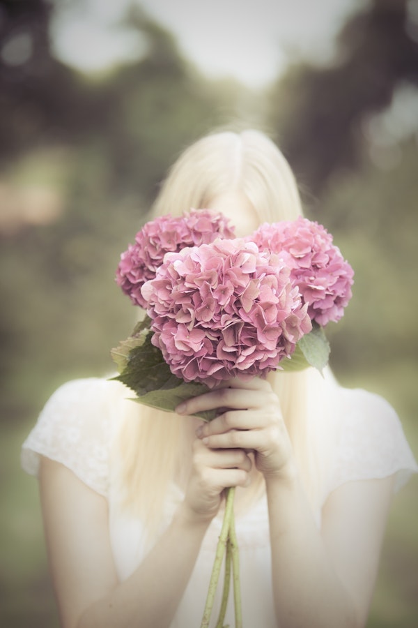Hiding behind flowers