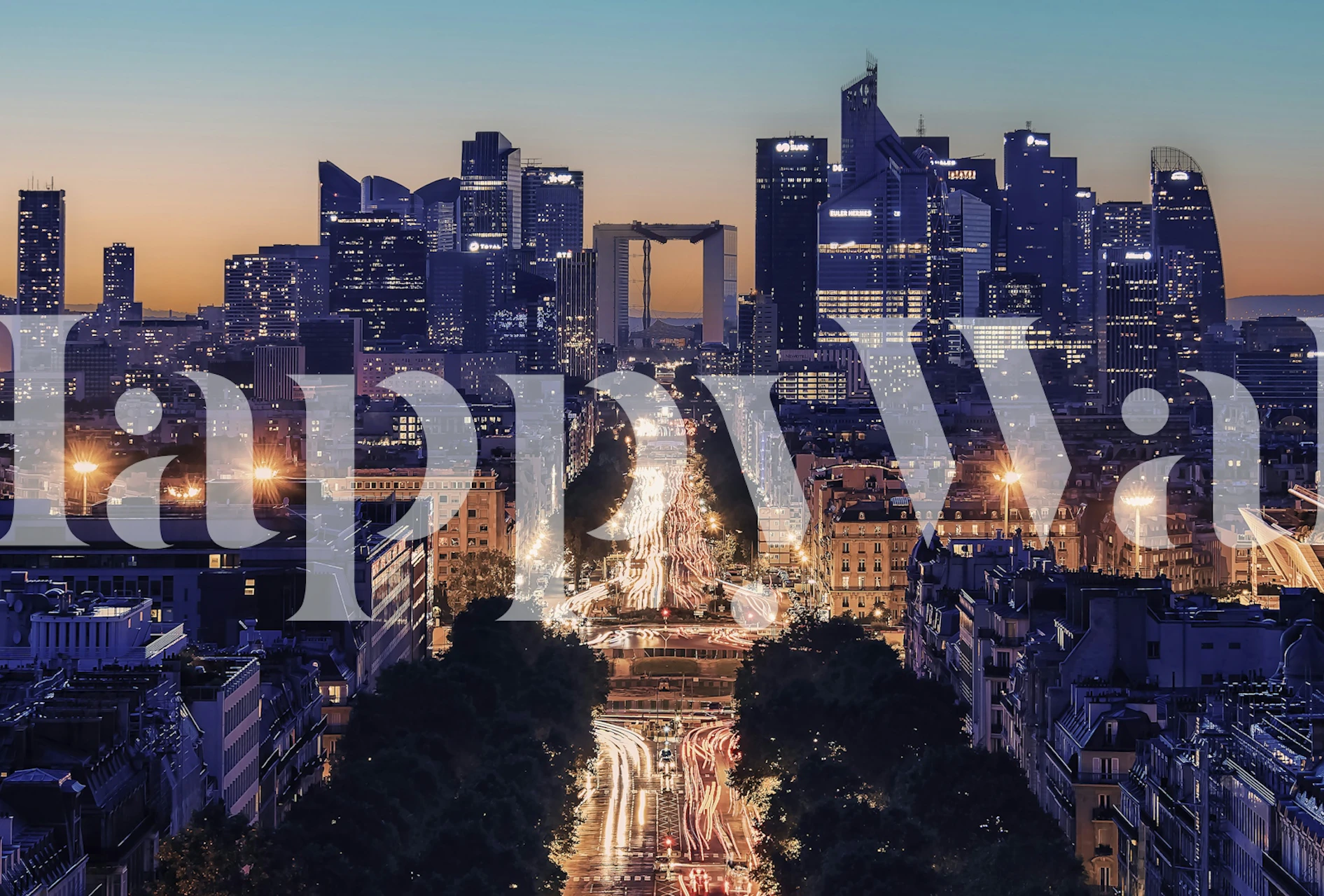 Cityscape at sunset with buildings and street lights wallpaper