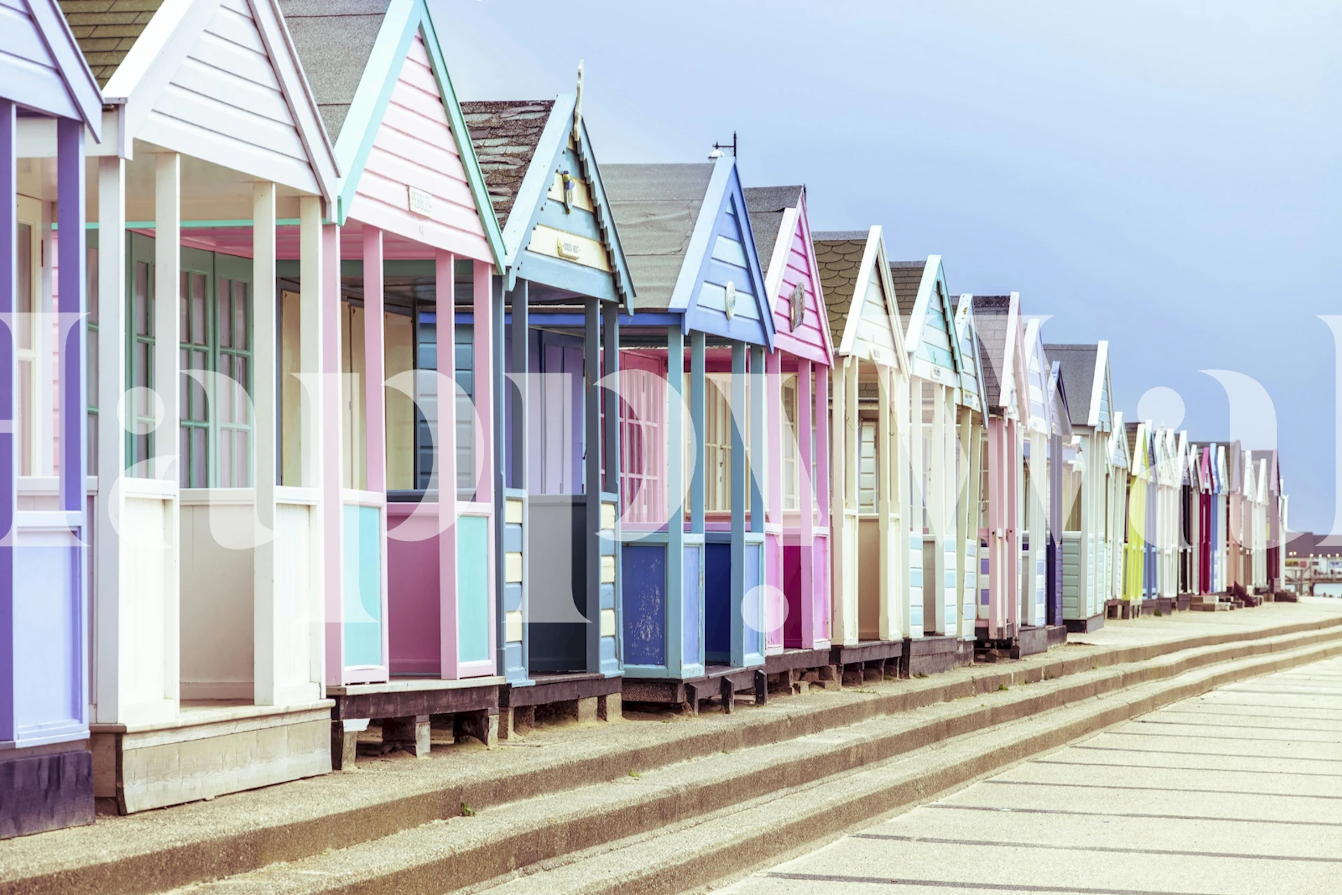Vibrant Beach Huts wallpaper in a room