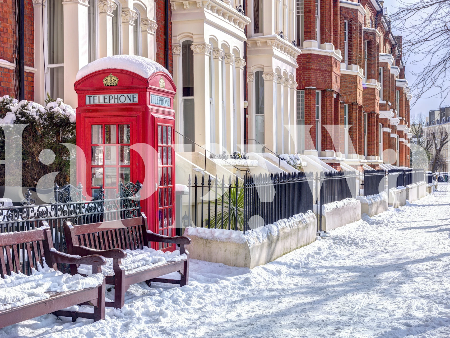 Snowy London wallpaper featuring a red telephone box