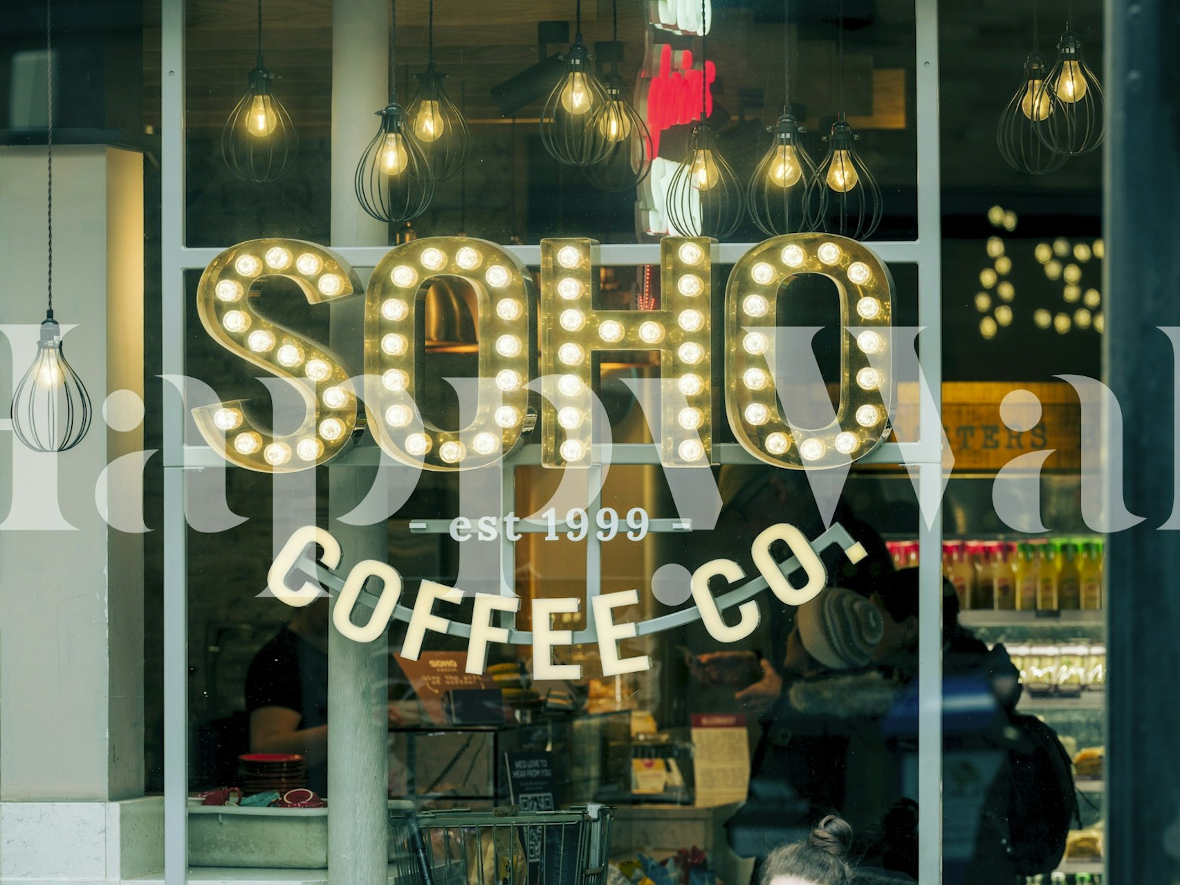 Illuminated coffee shop lettering wallpaper