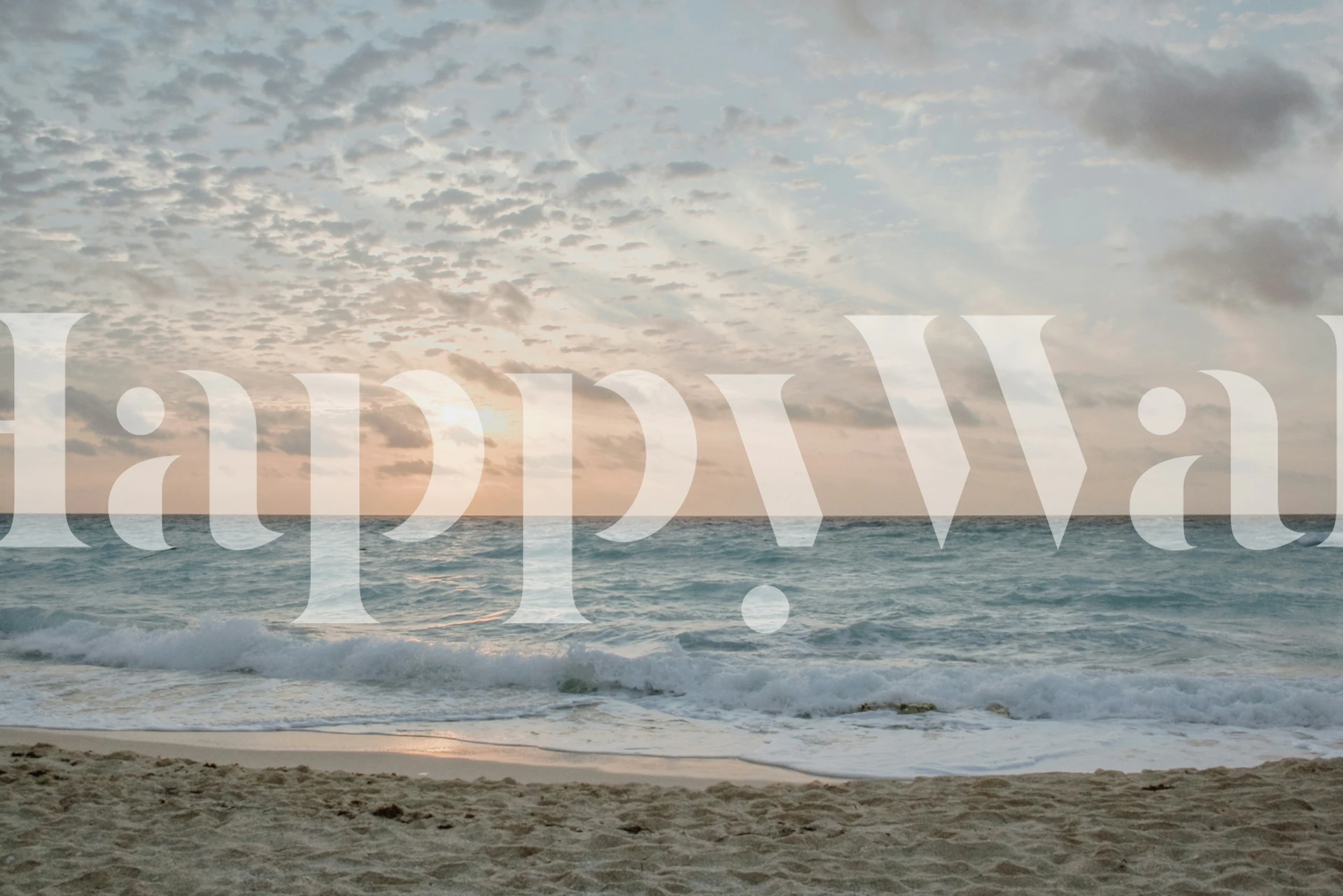 Coastal beach scene with sunset colors and water waves wallpaper