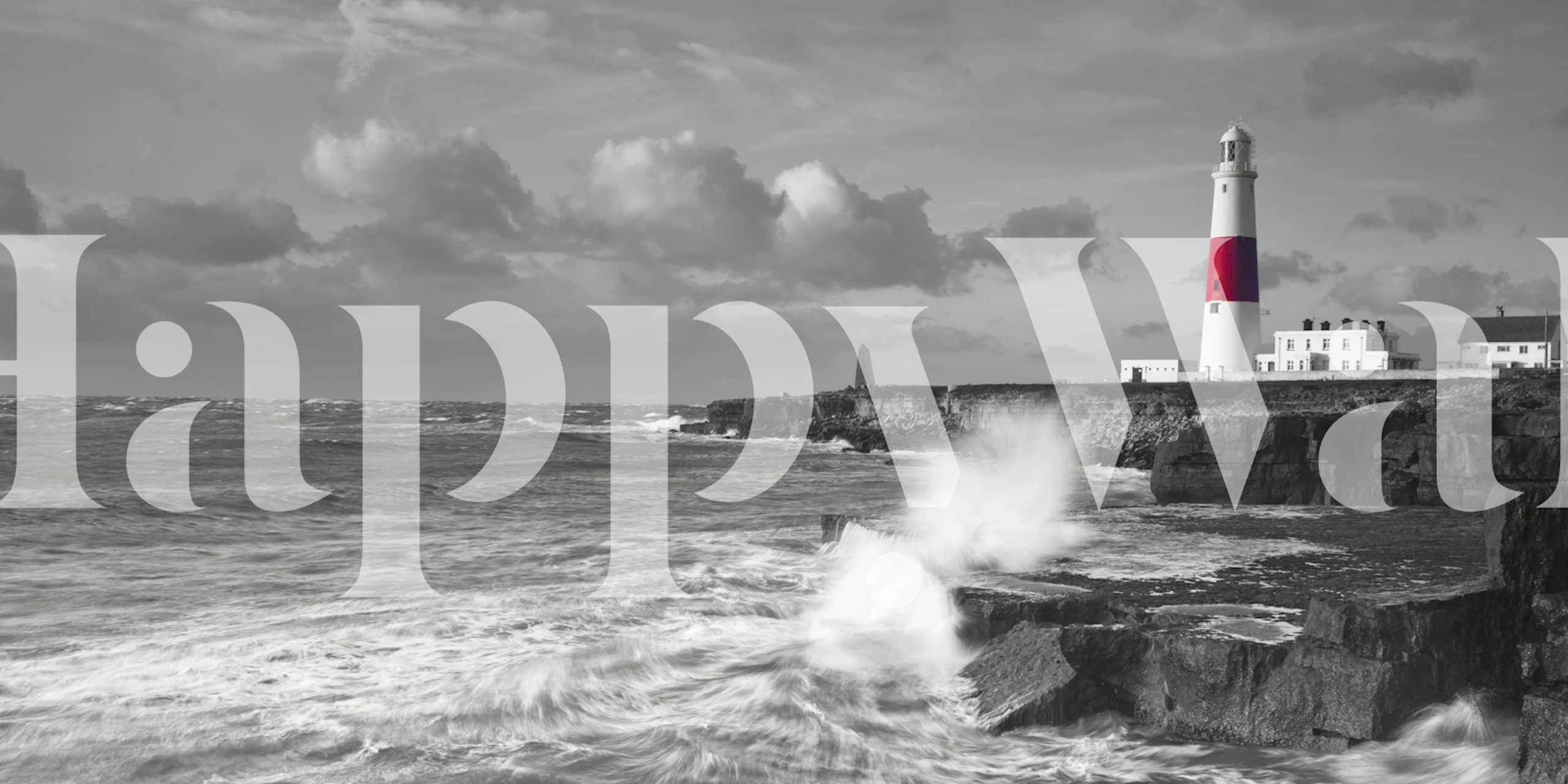 Mural en blanco y negro que representa un faro con olas rompiendo contra la orilla