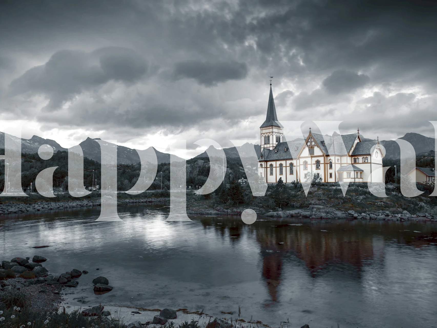 Black and white mountain landscape wallpaper with a church, lake, and dramatic sky.