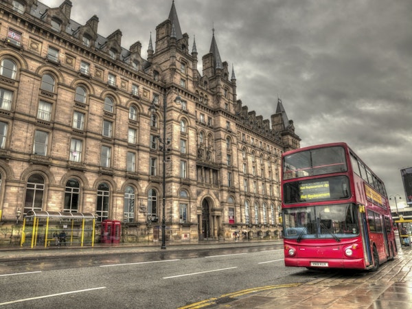 Red Bus by Northwestern Wall