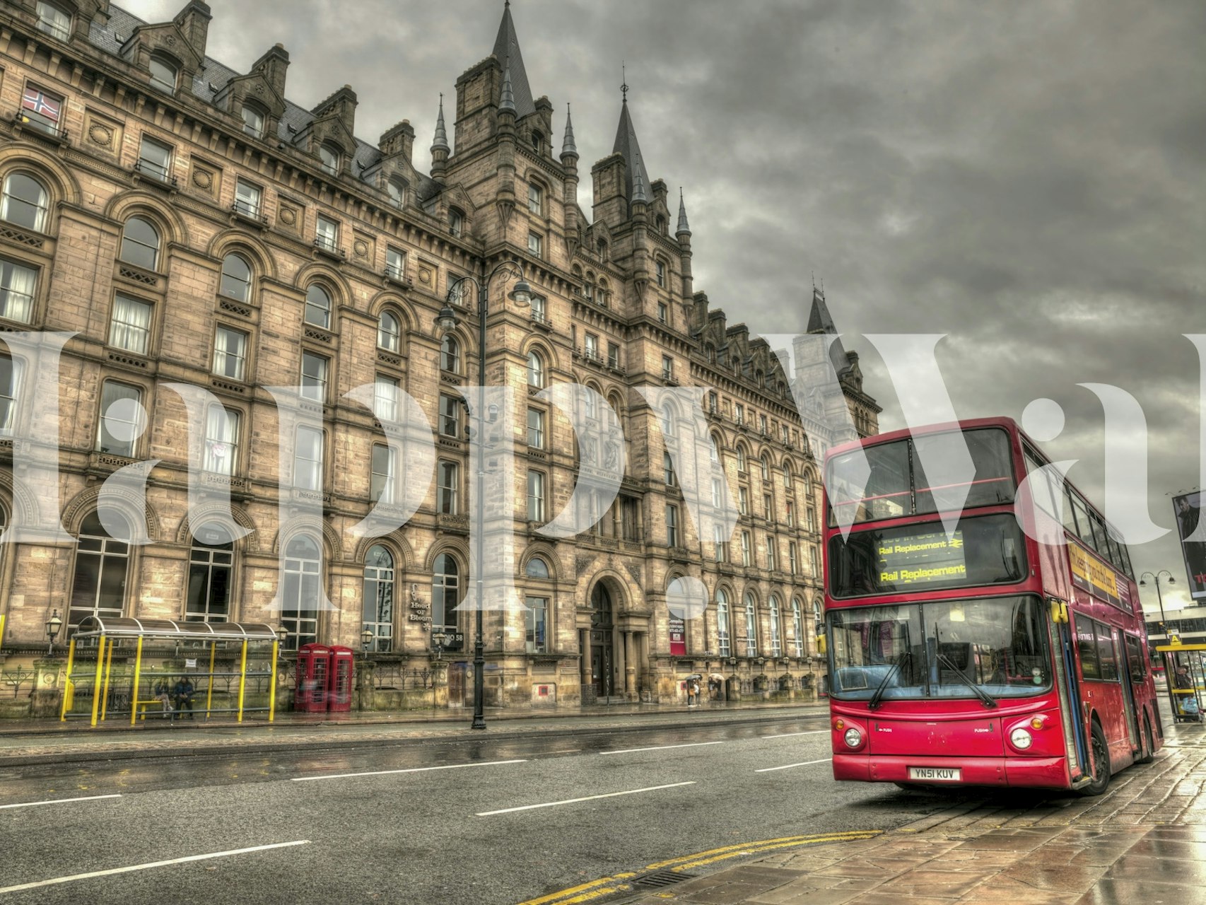 Red bus wallpaper in a room setting
