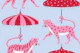 Big cats with parasols - pink red and blue