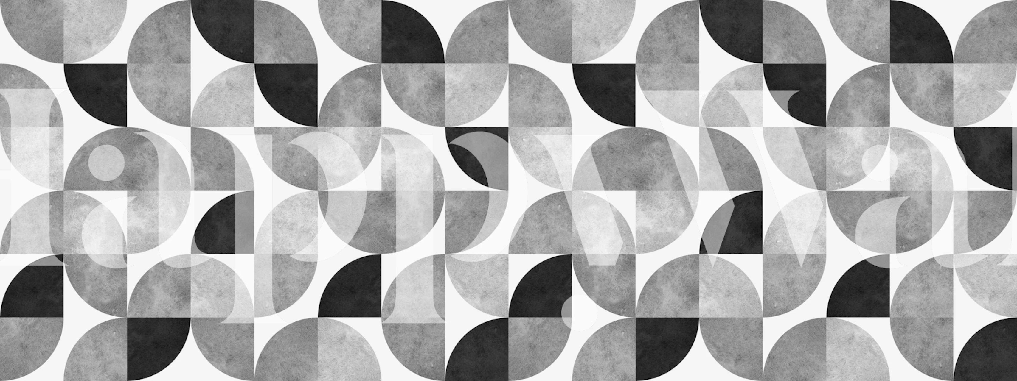 Geometric circle patterns in black, white, and gray wallpaper