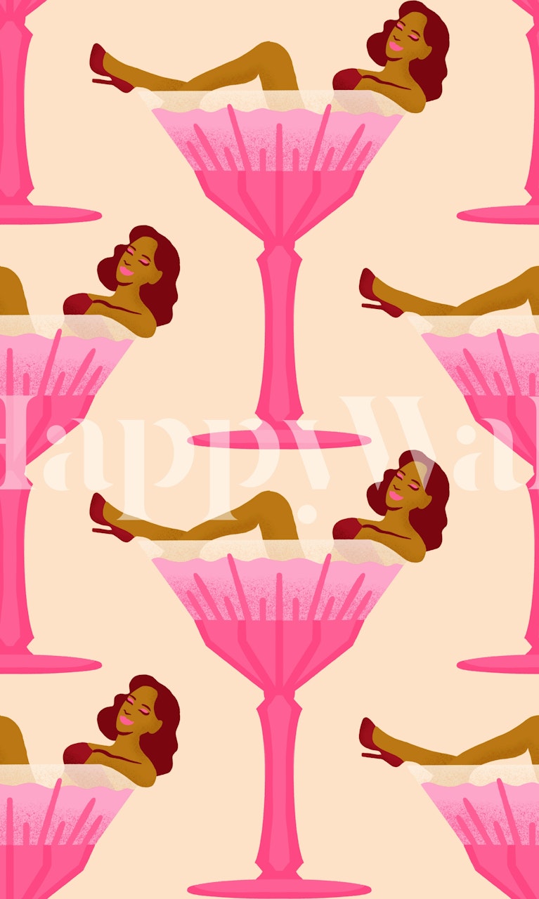 Pink martini glasses with playful motifs on cream wallpaper