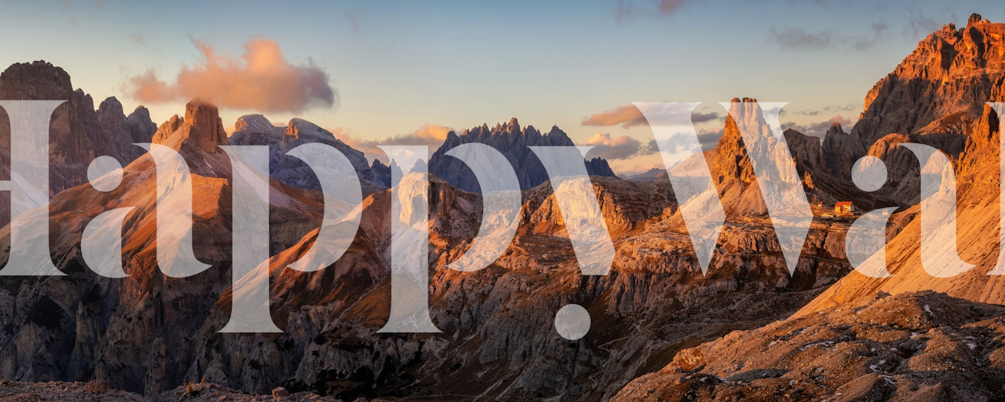 Mountain landscape wallpaper with warm orange and brown tones