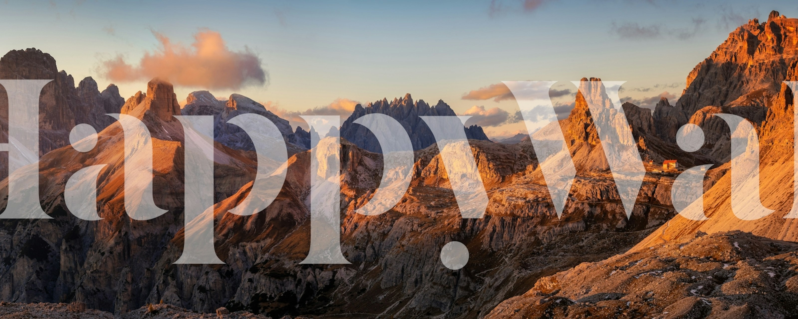 Mountain landscape at sunset with warm tones wallpaper