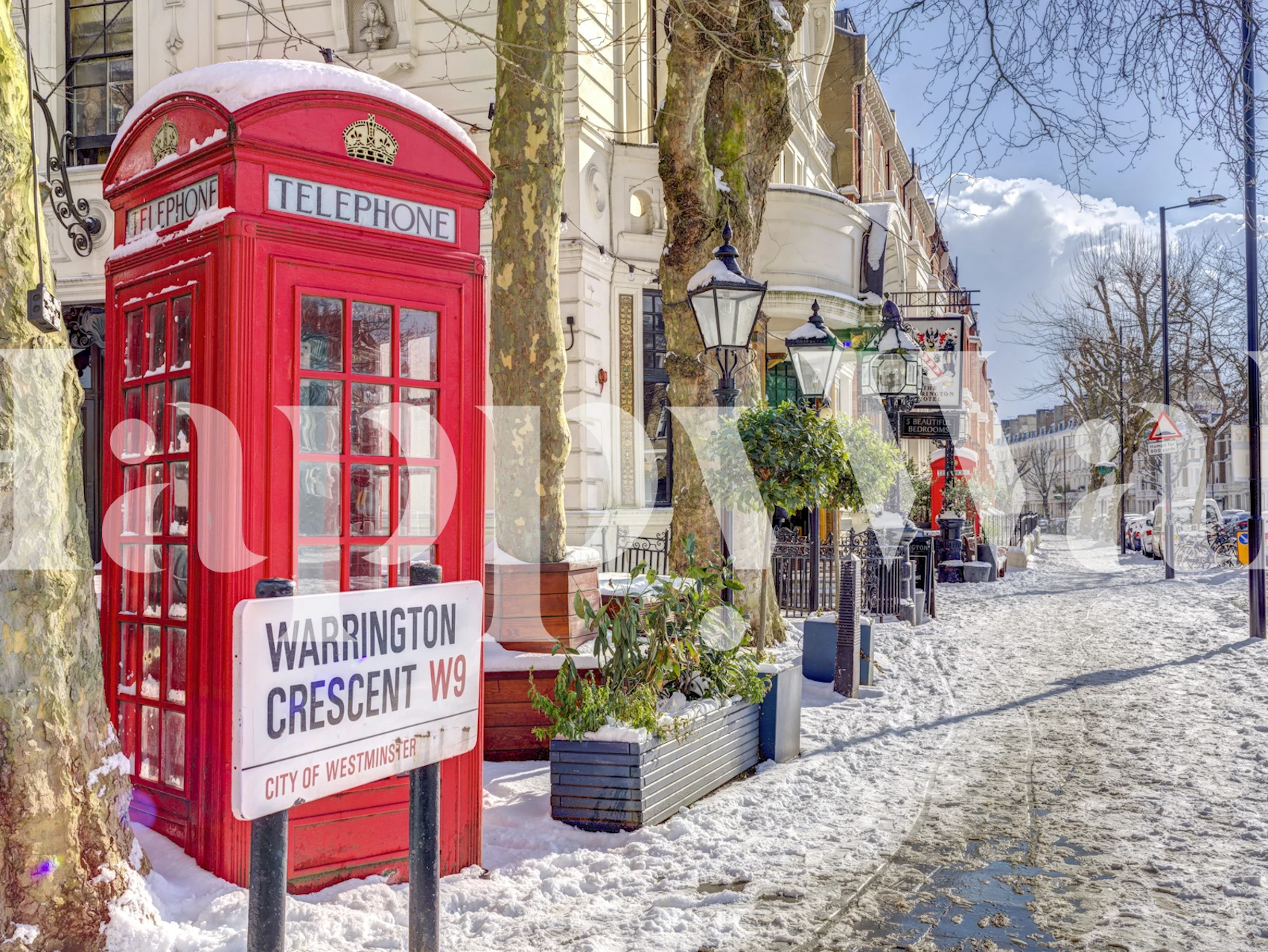 Maida Vale London street scene with red telephone box in snow