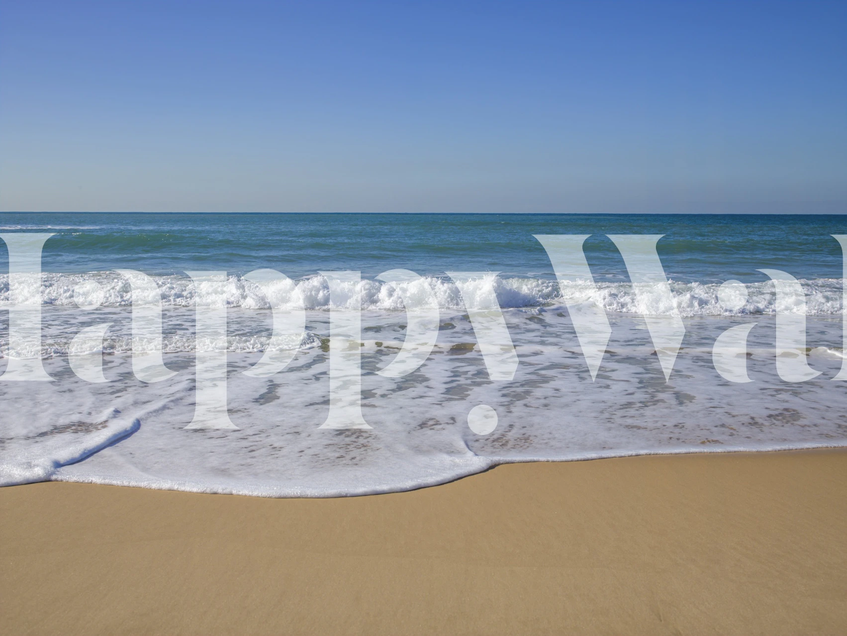 Ocean waves on sandy beach in blue tones wallpaper