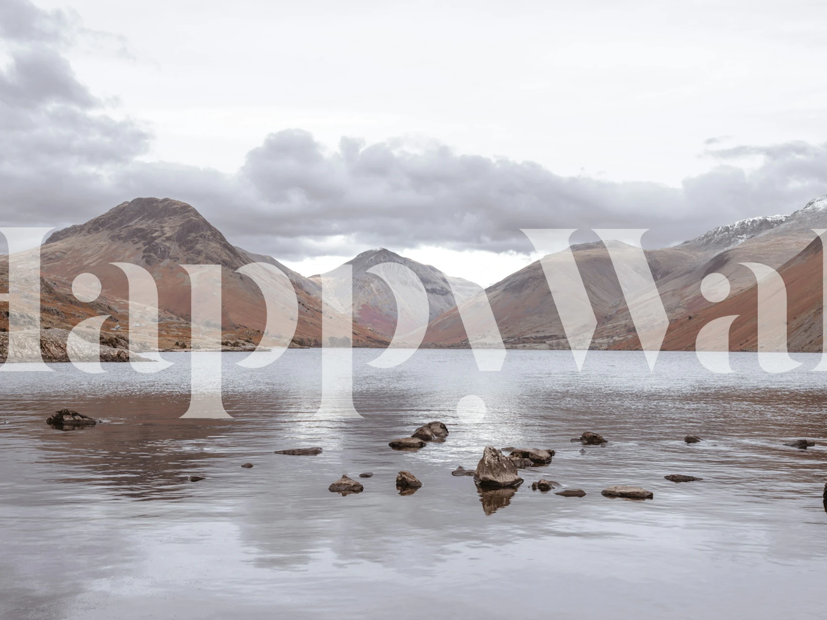 A wall mural of Wast Water with surrounding mountains and calm waters