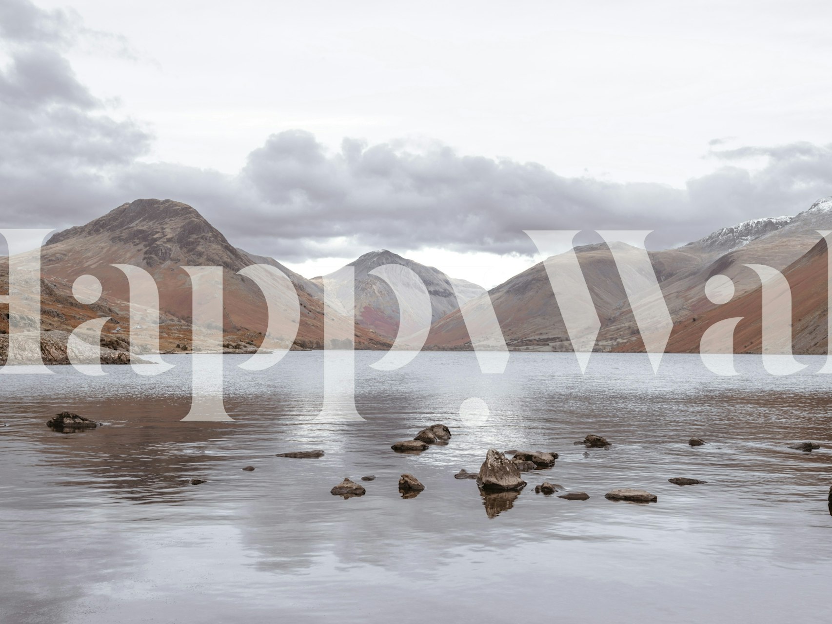 A wall mural of Wast Water with surrounding mountains and calm waters