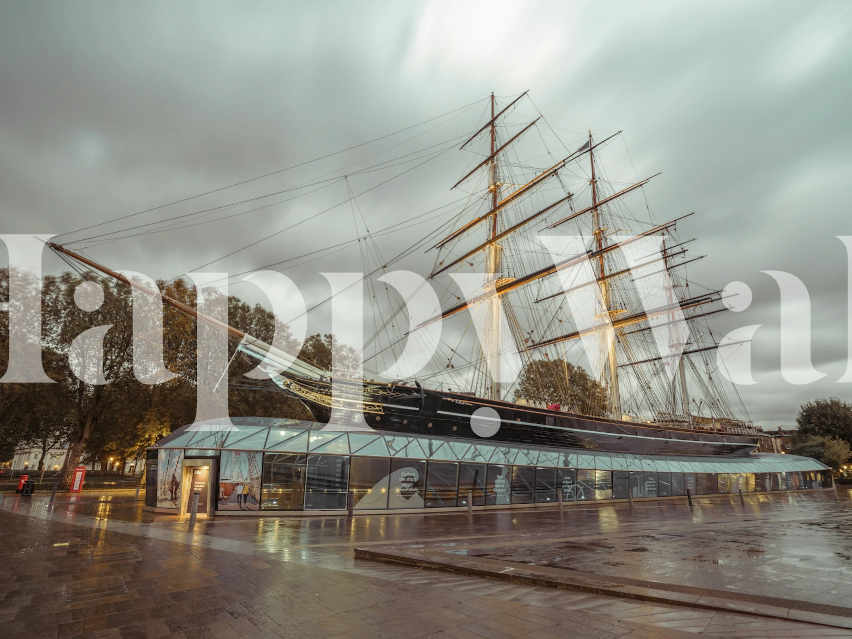 Historic sailing ship Cutty Sark with gray sky wallpaper