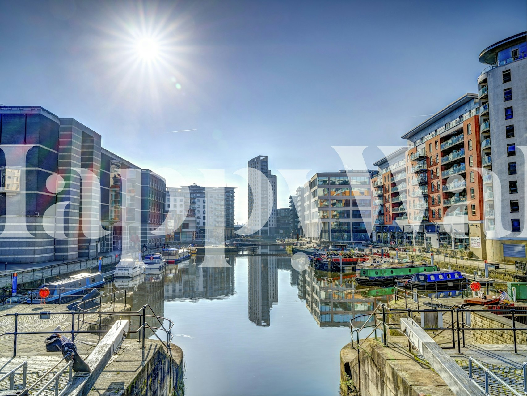 Urban cityscape with colorful buildings and water reflections wallpaper