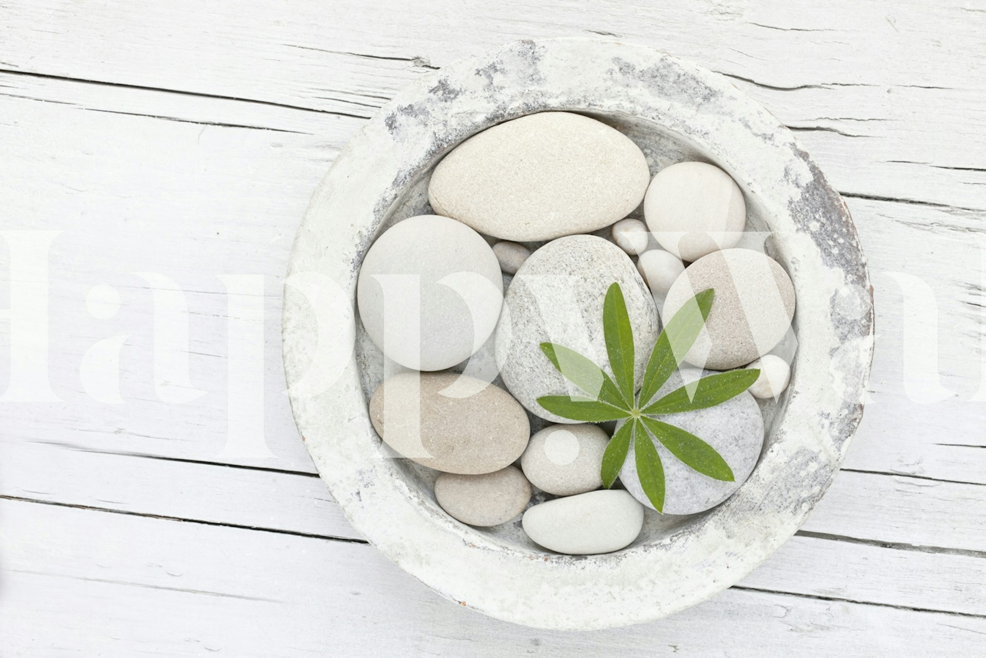 Zen style wallpaper with pebbles and leaf