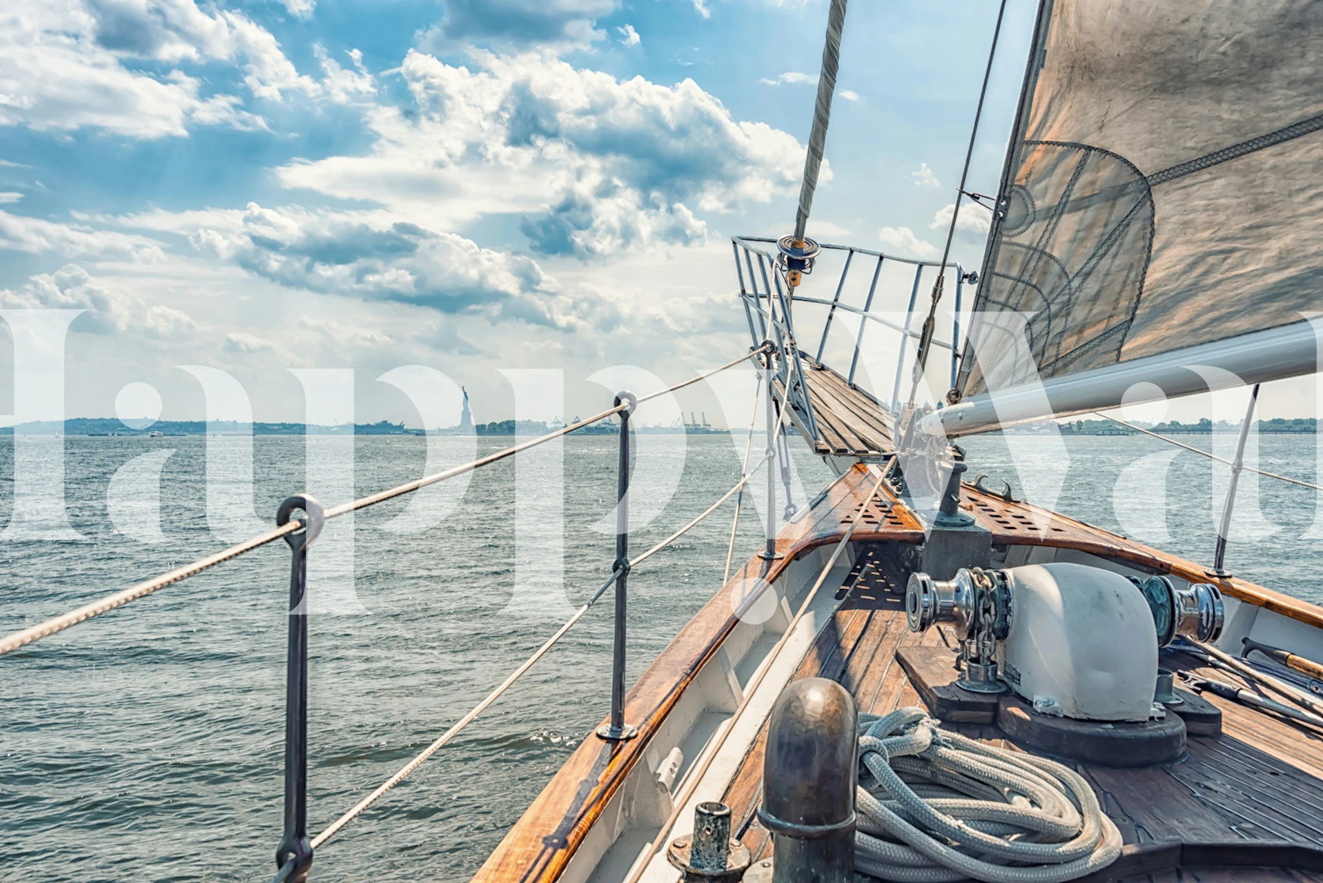 Sailing view with a sailboat on water, blue sky, and clouds wallpaper