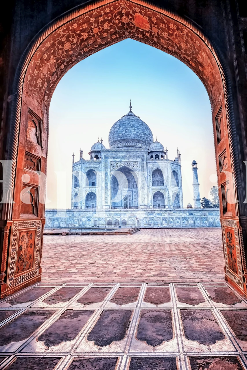 Taj Mahal viewed through a patterned archway in soft blue and earthy tones wallpaper