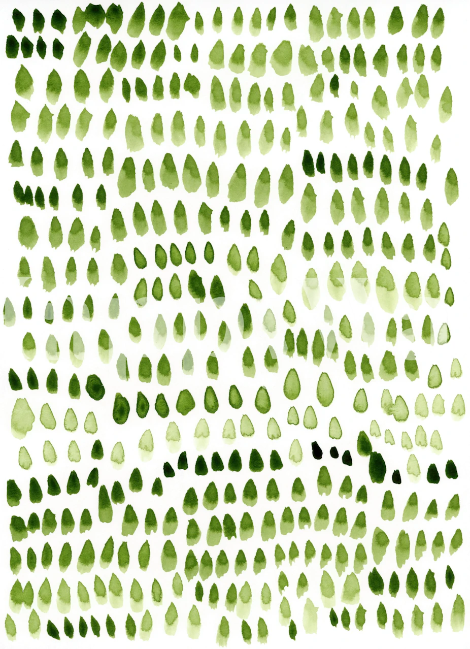 Green painted dots wallpaper in a room