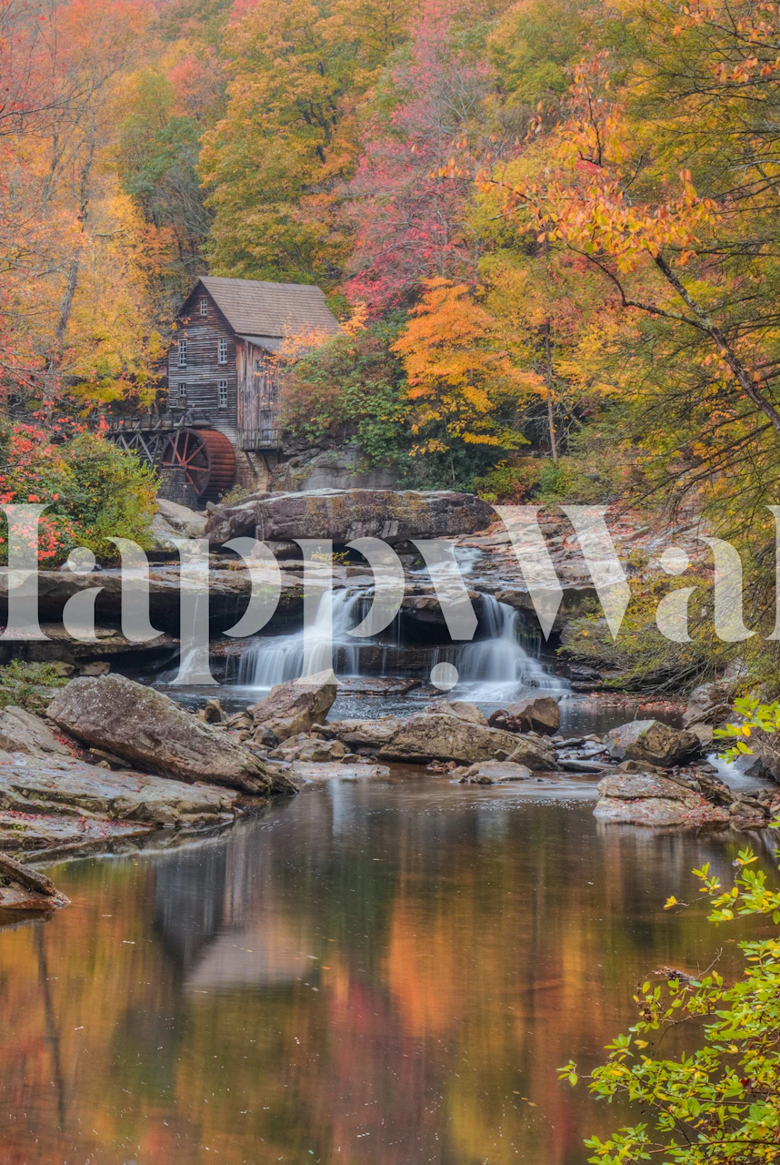 Rustic watermill by a waterfall surrounded by autumn trees wallpaper