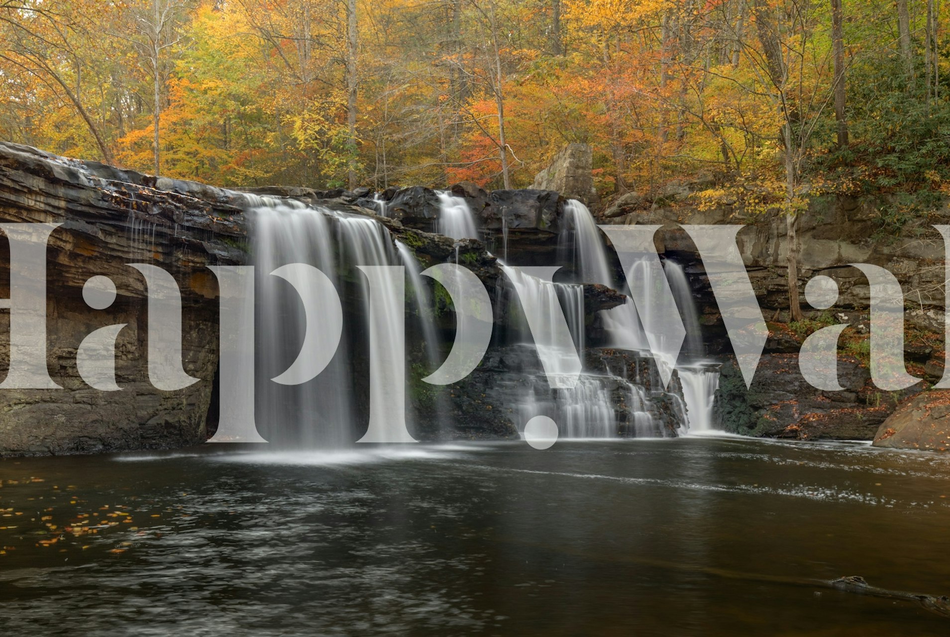 Autumn waterfall scene wallpaper