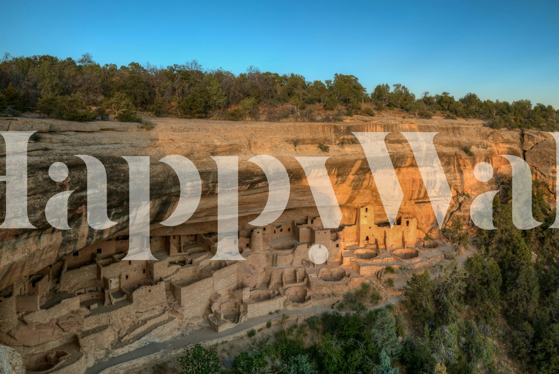 Cliff Palace at Mesa Verde with earthy tones and ancient structures wallpaper