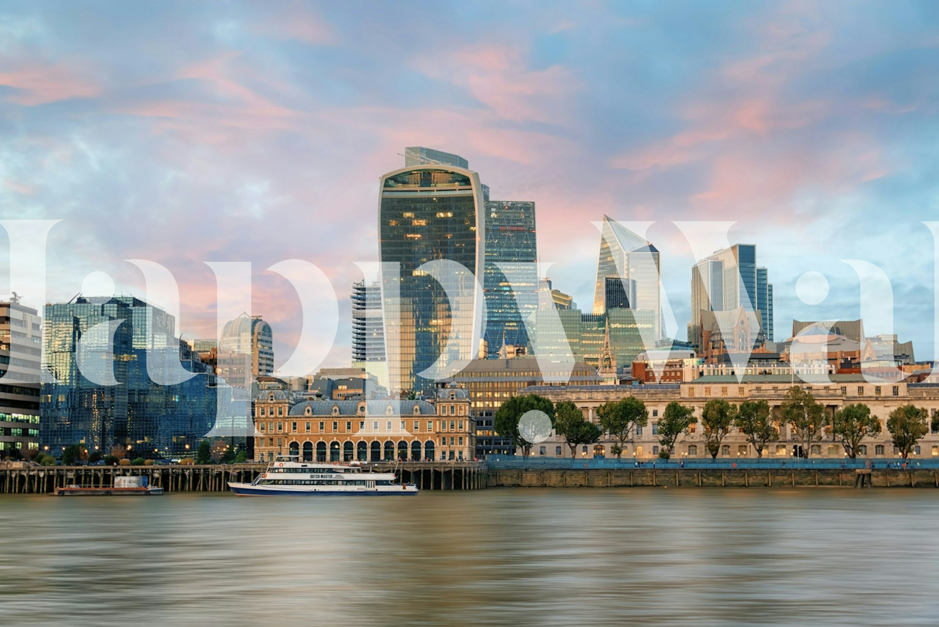 City skyline at sunset with pink and blue hues wallpaper