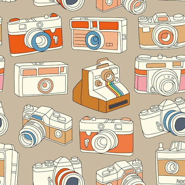 Vintage Cameras on Sand